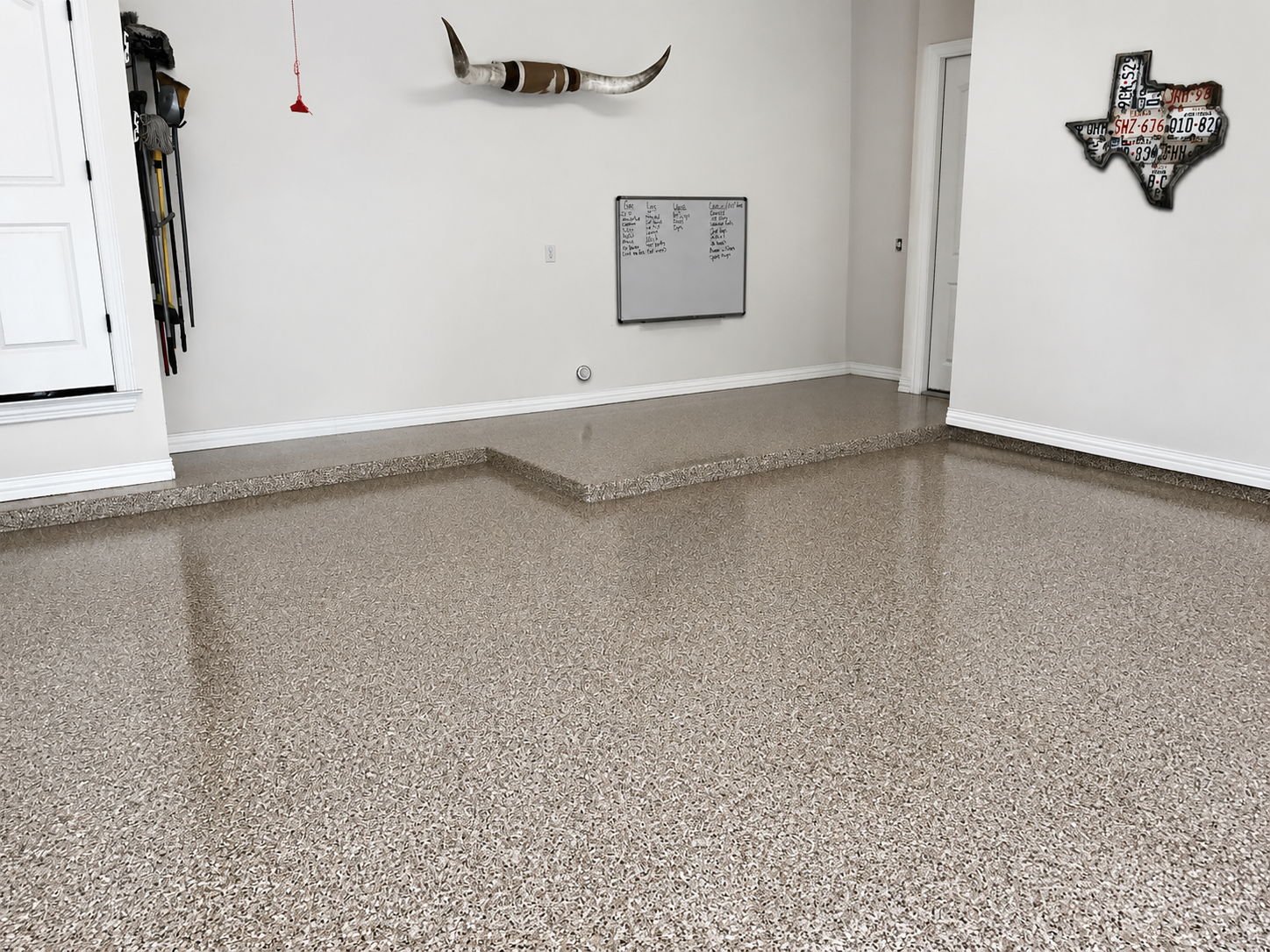 Chipped epoxy garage floor, Austin TX