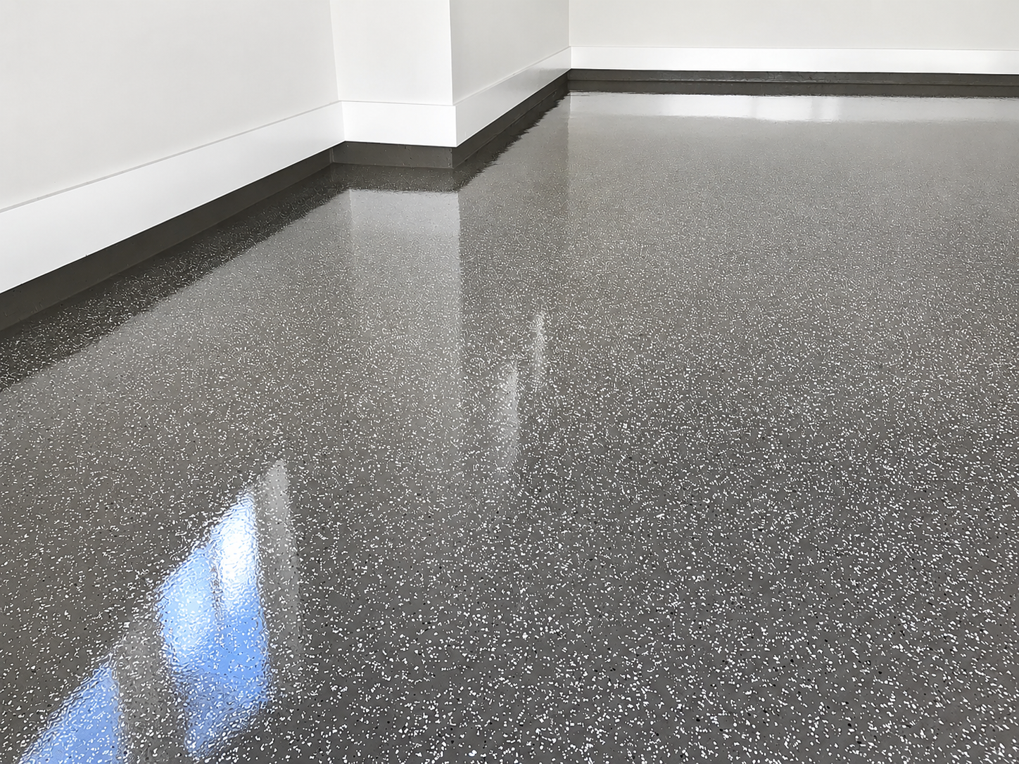 Chipped epoxy garage floor, Austin TX