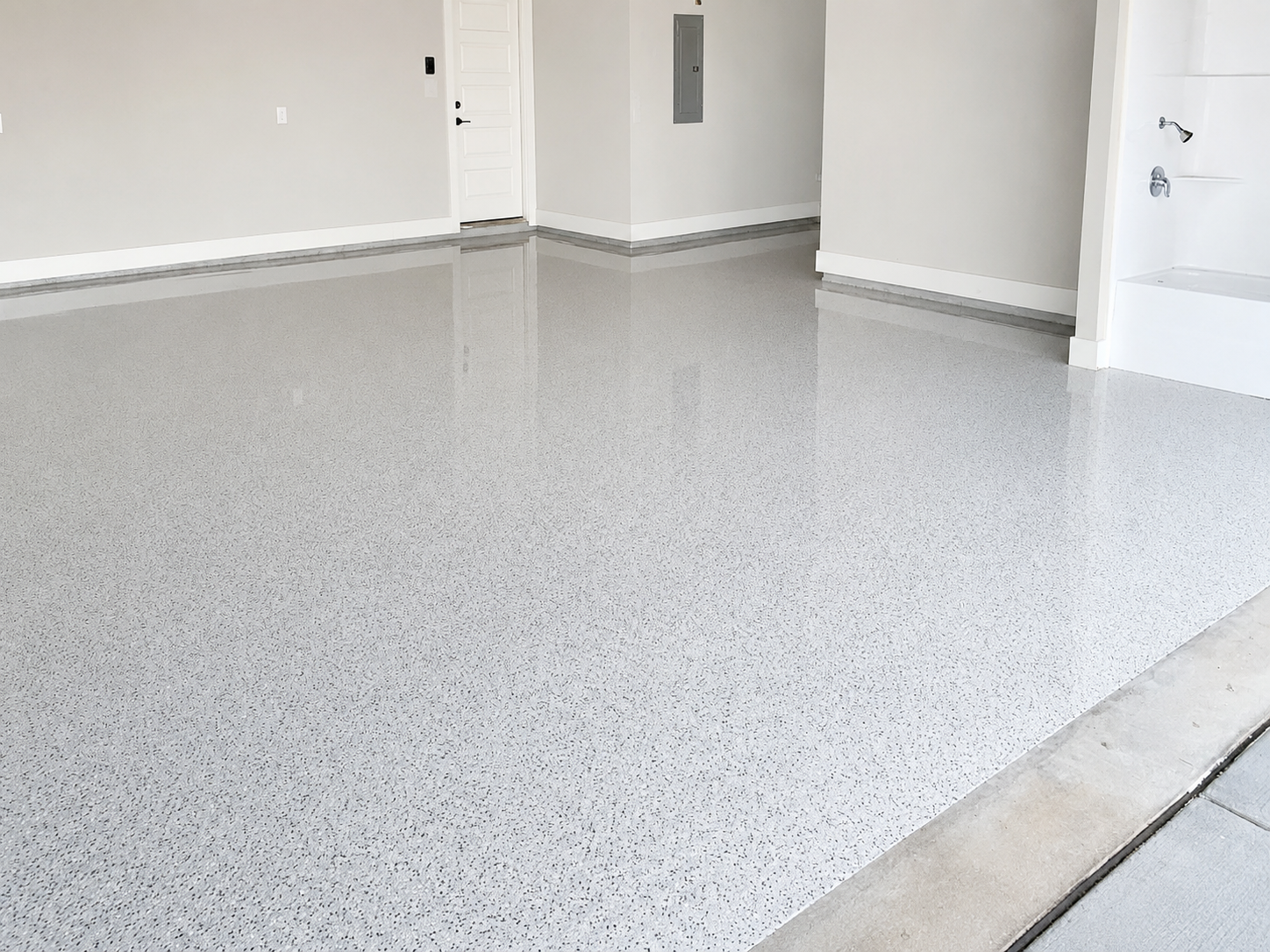 Chipped epoxy garage floor, Austin TX