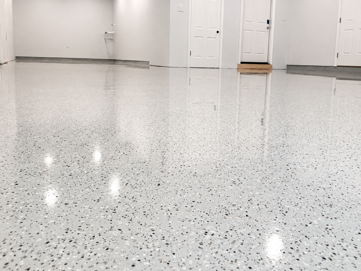 Chipped epoxy garage floor, Austin TX
