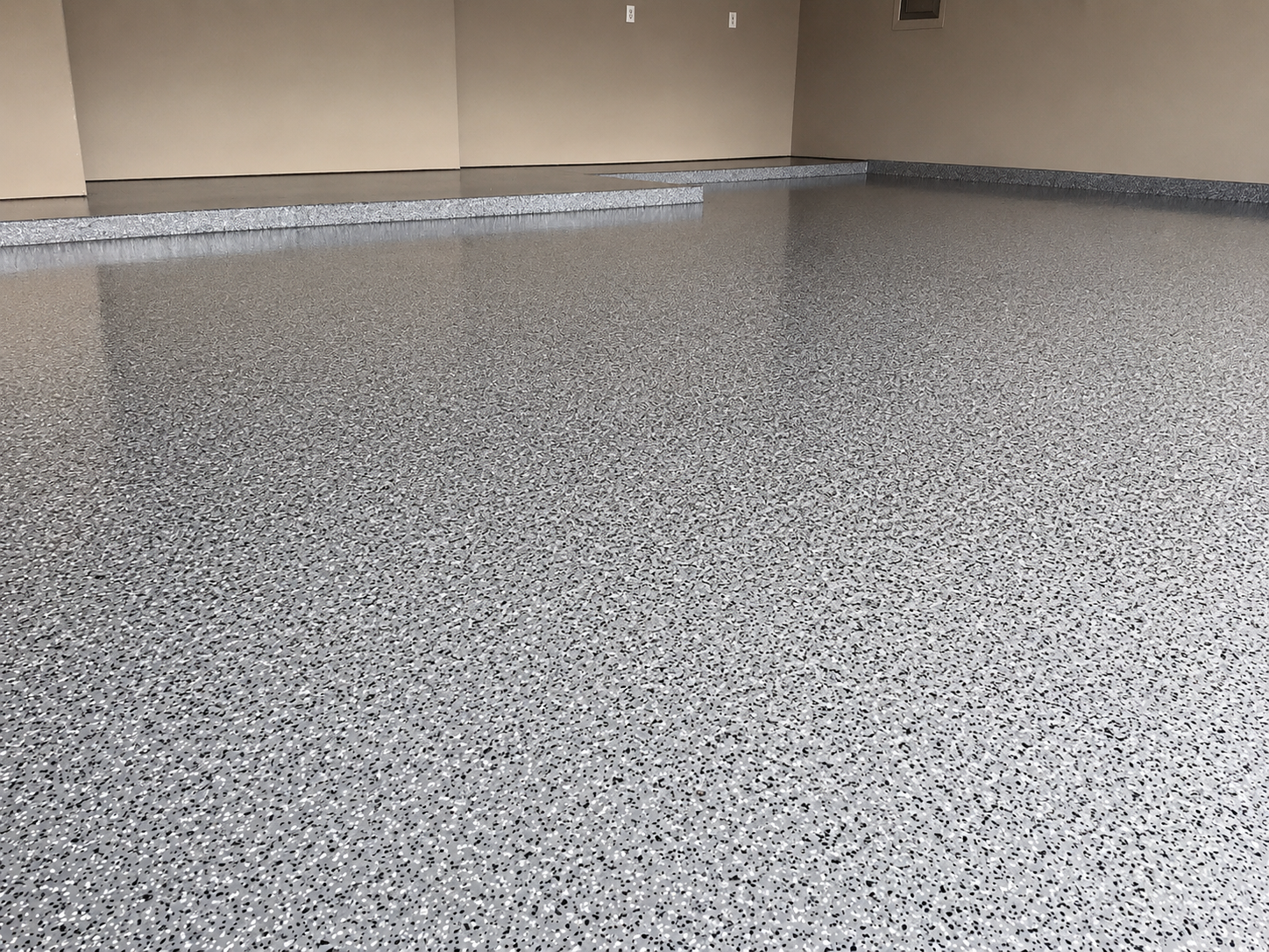 Chipped epoxy garage floor, Austin TX